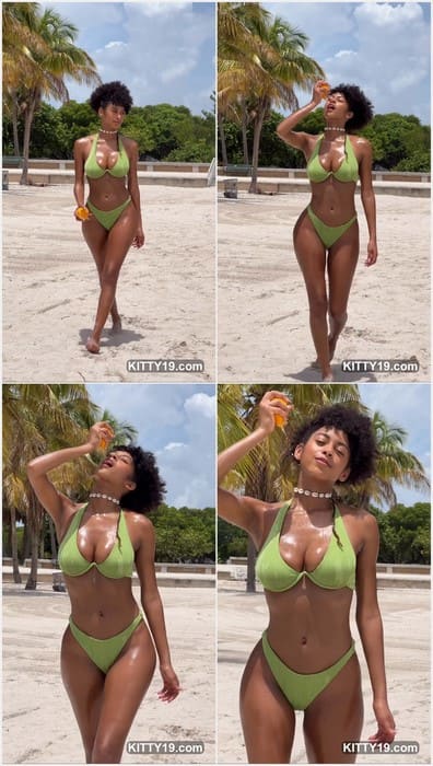 Briana Smith nude sexy black body in green bikini posing on the beach. Download it leak now and enjoy!