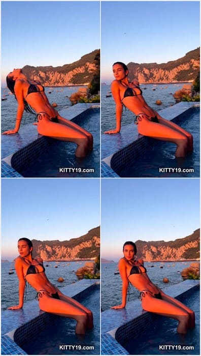 Elisha Herbert topless girl posing in hotel pool. Her beauty tits incredible looks with mini bikini. Pussy so wet now, i checked.