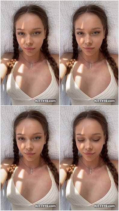 Wearing a soft white top, Kate Kuray nude lies in sunlight with her boyfriend nearby, both glowing in a peaceful and affectionate embrace.