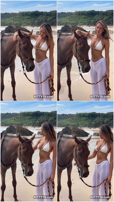 Emily Venz nude posing on the beach and showing her boobs in bikini on leaked video from her private iphone archive.